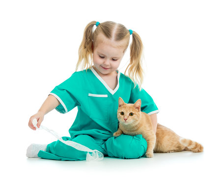 Cute kid playing doctor with cat isolated