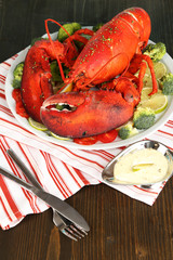 Red lobster on platter on table close-up