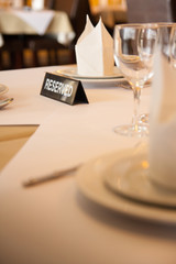 interior of modern restaurant , empty glass on table.
