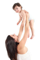 Fototapeta premium Attractive mother raising her baby and laughing