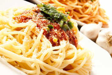 Pasta with sauce and parmesan