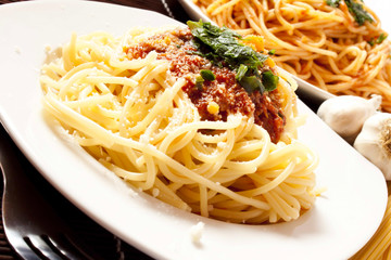 Pasta with sauce and parmesan