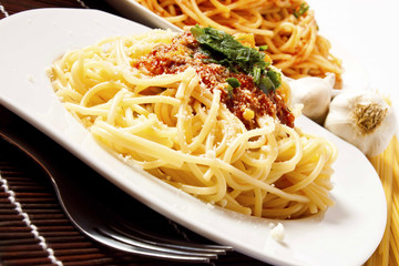 Pasta with sauce and parmesan
