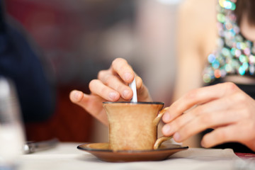 Woman drinking coffee
