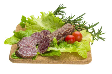 Salami with rosemary, salad and tomatoes