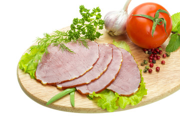 Ripe fresh ham with vegetables