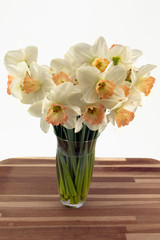 Daffodils in a glass vase.