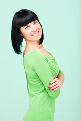 woman in green dress smiling