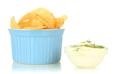 Potato chips in bowl and sauce, isolated on white