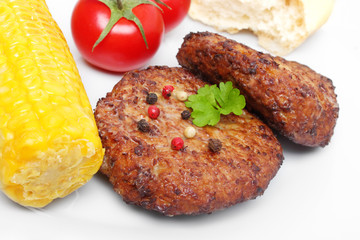 Beefsteak with corncob - Frikadelle mit Maiskolben