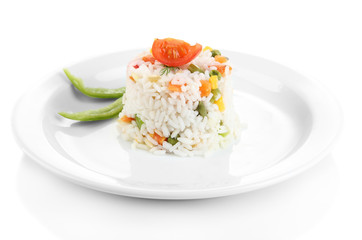 Delicious risotto with vegetables, isolated on white