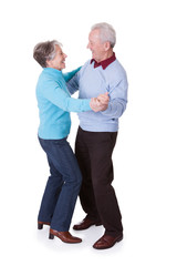 Portrait Of Senior Couple Dancing