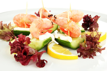 Small portion of food on big plate close up