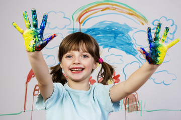 a happy little girl with her picture