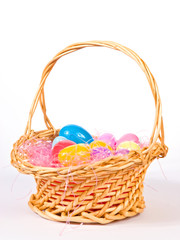 Easter basket with colorful eggs