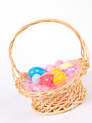 Fototapeta na wymiar Easter basket with colorful eggs