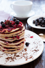 mini berry cake with berries on top