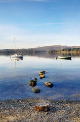 Obraz premium Two boats moored on Lake Windermere