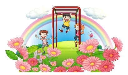 Abwaschbare Fototapete Regenbogen Ein Park auf den Hügeln mit spielenden Kindern
