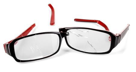 Broken glasses isolated on white