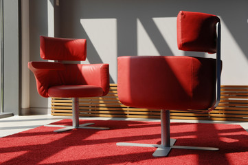 Two Red Seats In A Meeting Room