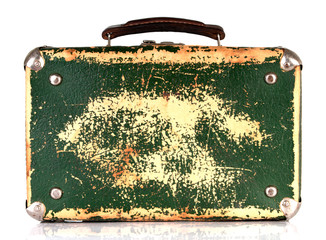 Old green shabby suitcase
