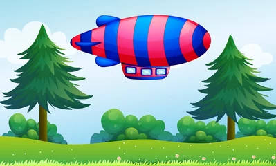 Abwaschbare Fototapete Flugzeuge, Ballon Ein buntes Flugzeug über den Hügeln