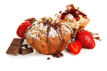 Tasty muffin cakes with strawberries and chocolate, isolated
