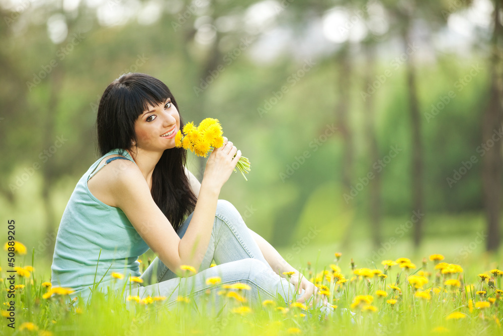 Poster cute woman in the park with dandelions