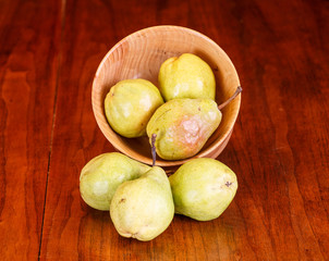 Three Pears Each on Table and in Bowl