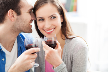 Young couple drinking wine