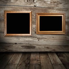 two golden frames in vintage room