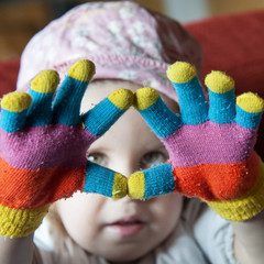 Happy child with colorful hands