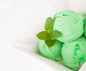 green ice cream in a bowl 