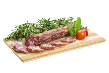 Salami with rosemary, basil and tomato