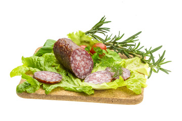 Salami with rosemary, salad and tomatoes