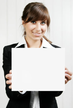 Smiling woman holding an empty card