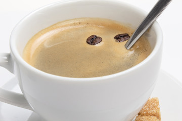 close up of espresso cup with crema