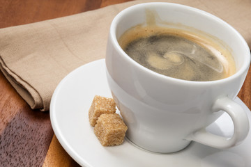 cup of espresso with cane sugar
