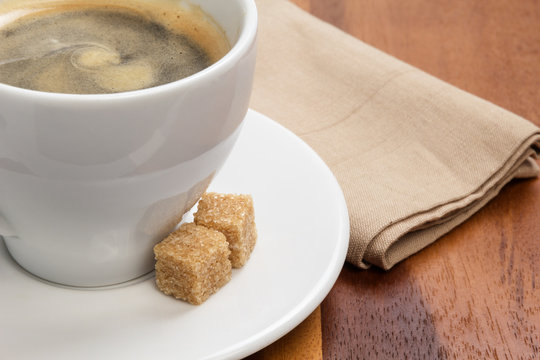 cup of espresso with cane sugar