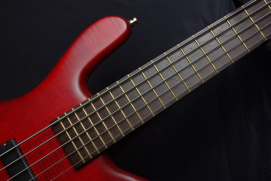 Bass guitar with red body