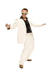 Mad disco dancer in white suit and snake leather boots