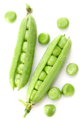 Fresh green peas on white background