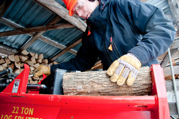 Splitting wood in the woodshed