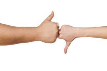 male and female hand showing thumbs like and dislike on white