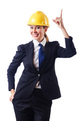 Young businesswoman with hard hat on white