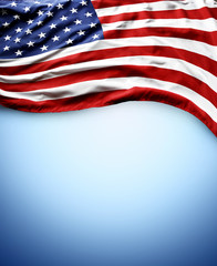 American flag on blue background. Copy space