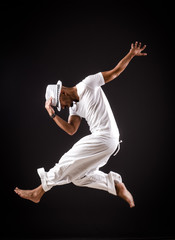 Dancer dancing dances in white clothing