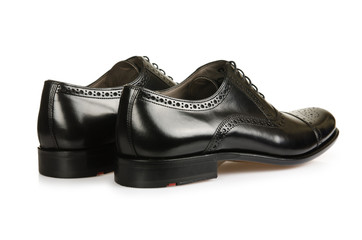 Fashion concept with male shoes on white