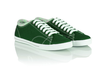 Sporty shoes in sport shoes concept on white